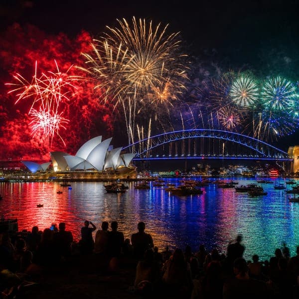 Harbor Fireworks jigsaw puzzle — Midnight fireworks doubling themselves across a busy harbor.